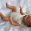 AD7 Levensechte Babypop Lisa soft body met slaapogen en speen 52 cm - Afbeelding 7