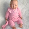 AD6a Levensechte Babypop soft body flexibel met kleding 53 cm
